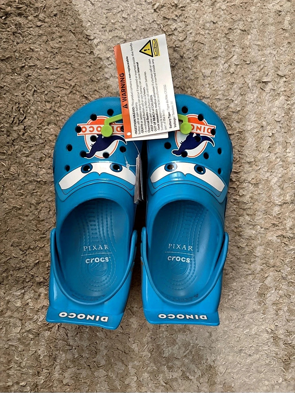 Dinoco crocs m6 w8, nwt
